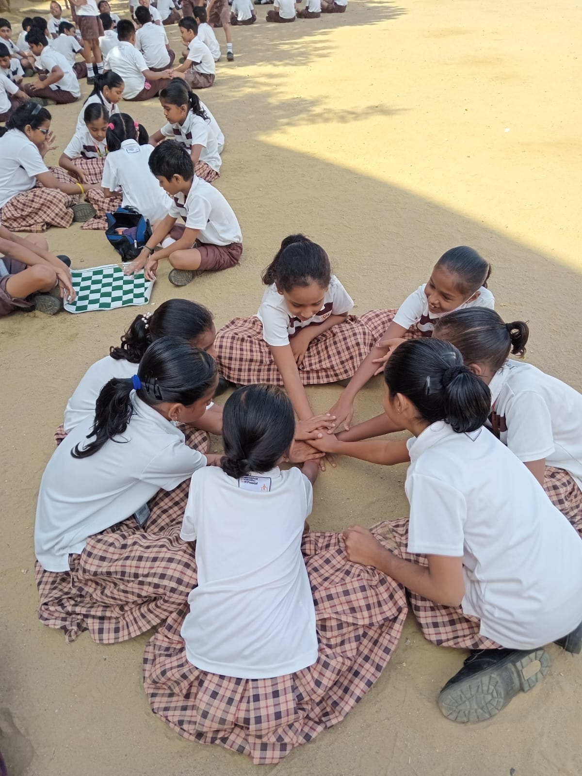 To wean off children from the addictive habit of playing with mobiles, Class.4 children were encouraged to try their hands at traditional games like palanguzhi, paramapadam, chess, etc.